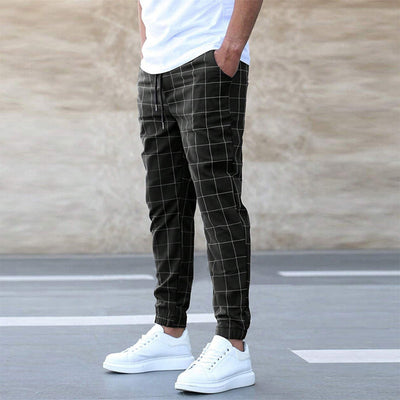 Elegante vrijetijdsbroek voor mannen in khaki met een ruitpatroon, ideaal voor casual en semi-formele gelegenheden.