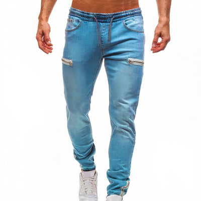 Stijlvolle slim-fit joggingbroek van denim met ritsdetails en elastische tailleband.